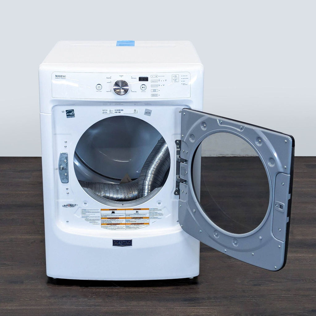 Front view of a white Maytag MED3500FW0 front load dryer with the door open, showing spacious interior.  