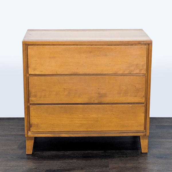 Conant Ball dresser with clean lines, three drawers, and natural wood finish in a mid-century modern style.  