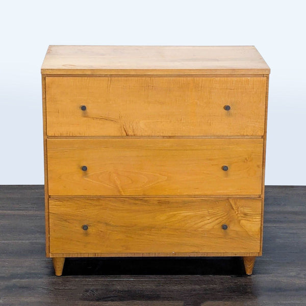 1. Mid-century modern dresser with three spacious drawers, round metal knobs, and a warm natural wood finish.