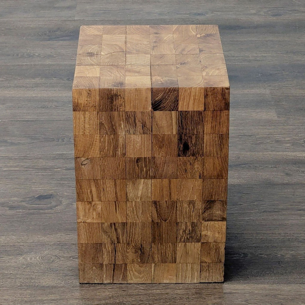 2. Cube-shaped console table constructed from multiple wood blocks, displaying a natural, textured wood grain pattern.  