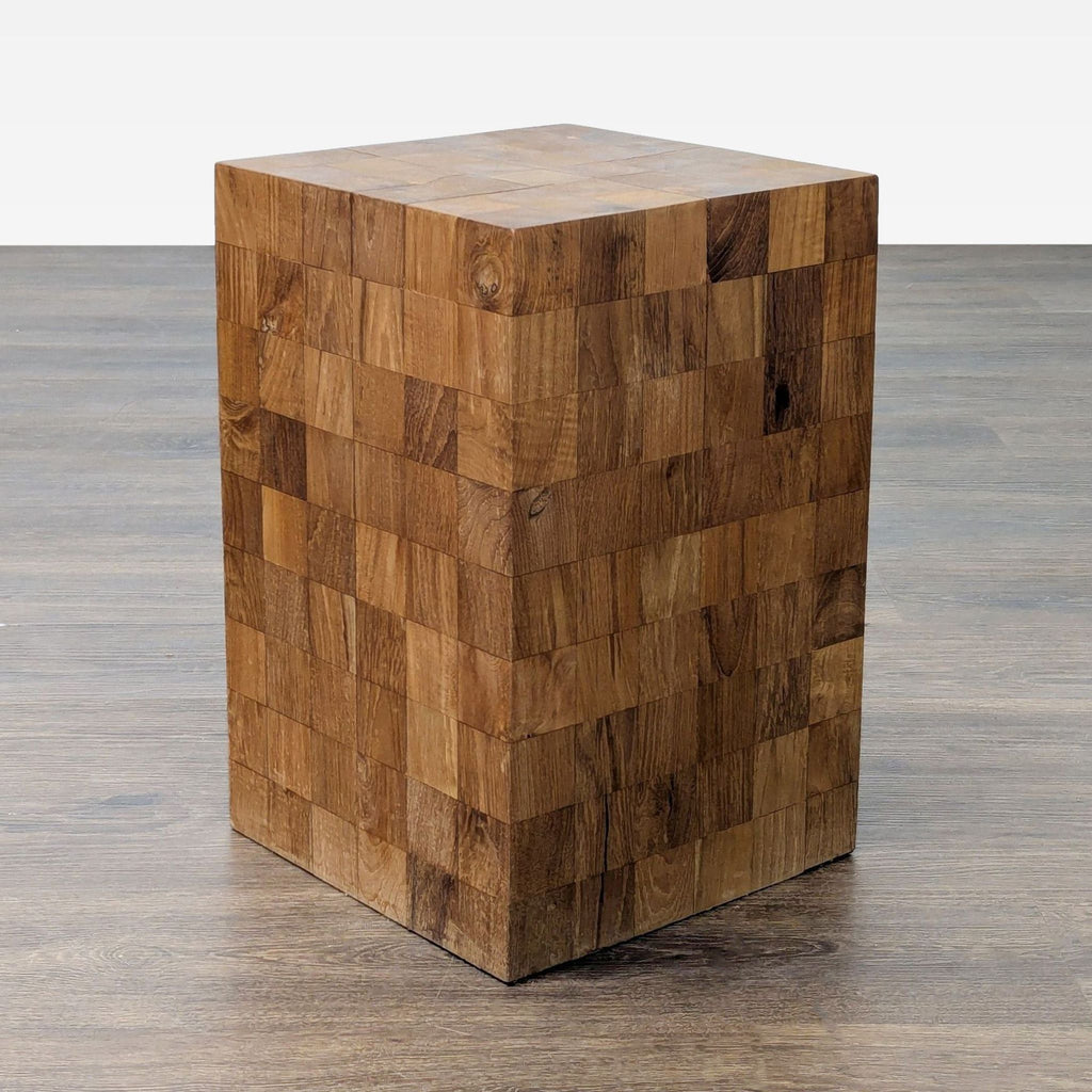 1. Solid wood side table with a cubic shape, crafted from square end-grain wood blocks, shown on a wood floor.  
