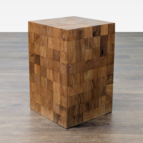 1. Solid wood side table with a cubic shape, crafted from square end-grain wood blocks, shown on a wood floor.  