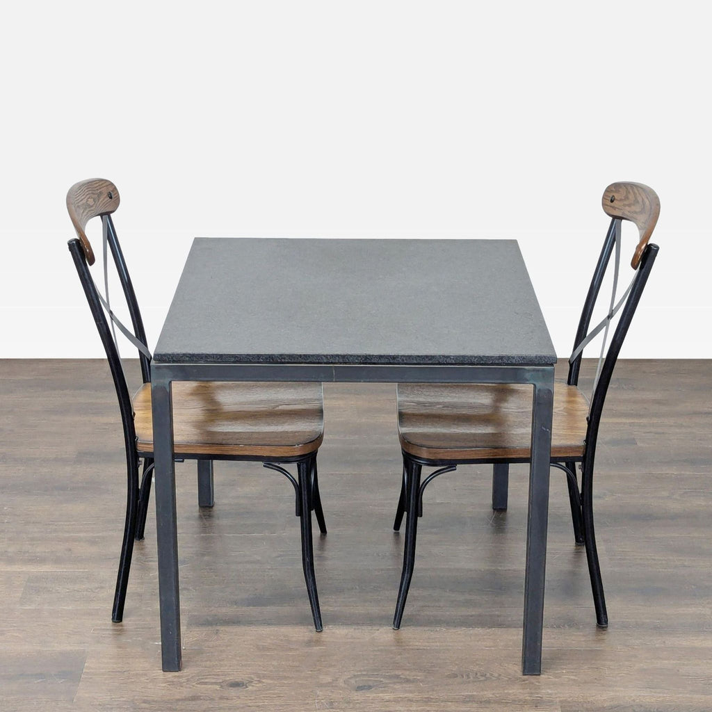 Prime Resource dining set with a simple table and two chairs, combining durability and modern style for small areas.