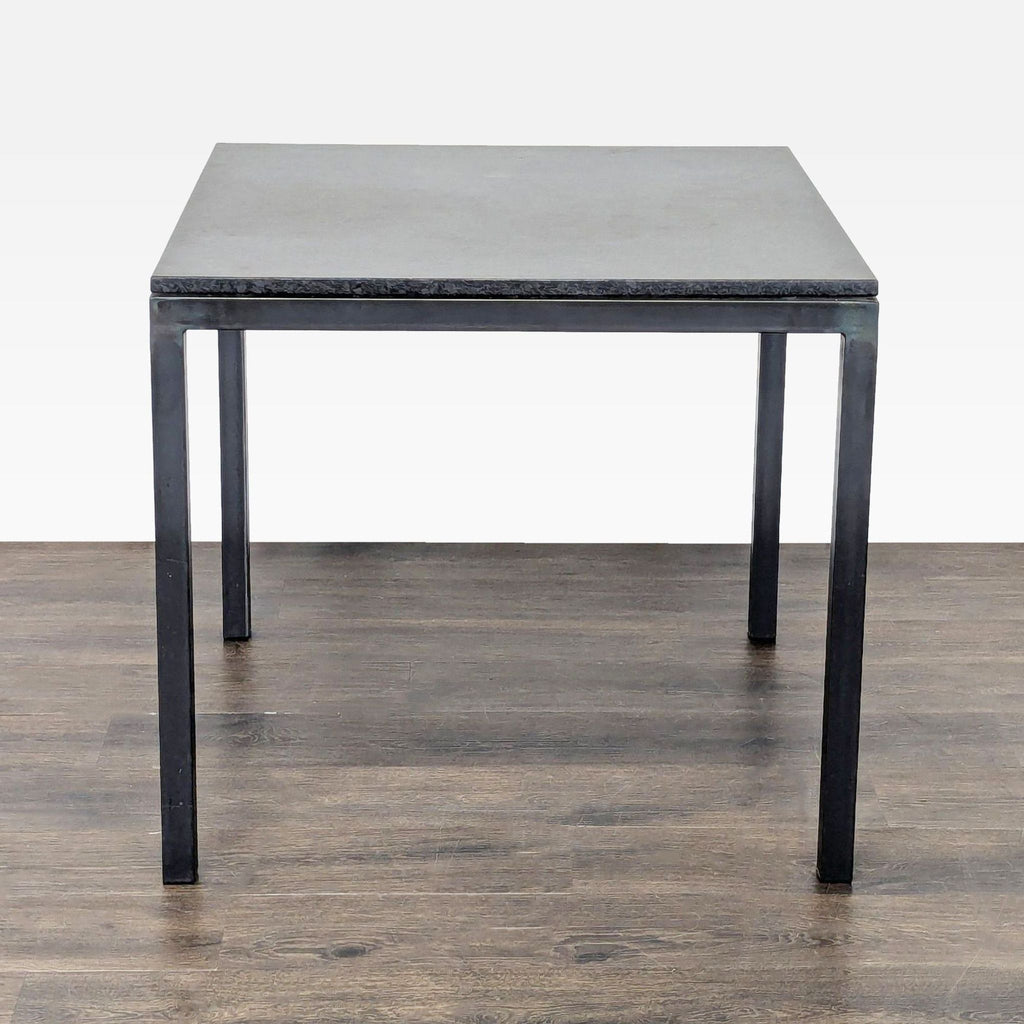 Compact dining set by Prime Resource featuring a sturdy table and two chairs, perfect for kitchens or apartments.