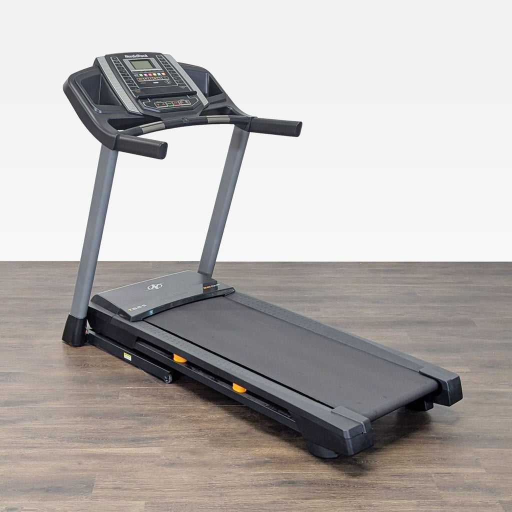 2. Angled front view of a NordicTrack treadmill featuring easy-to-use controls, ideal for any home gym.