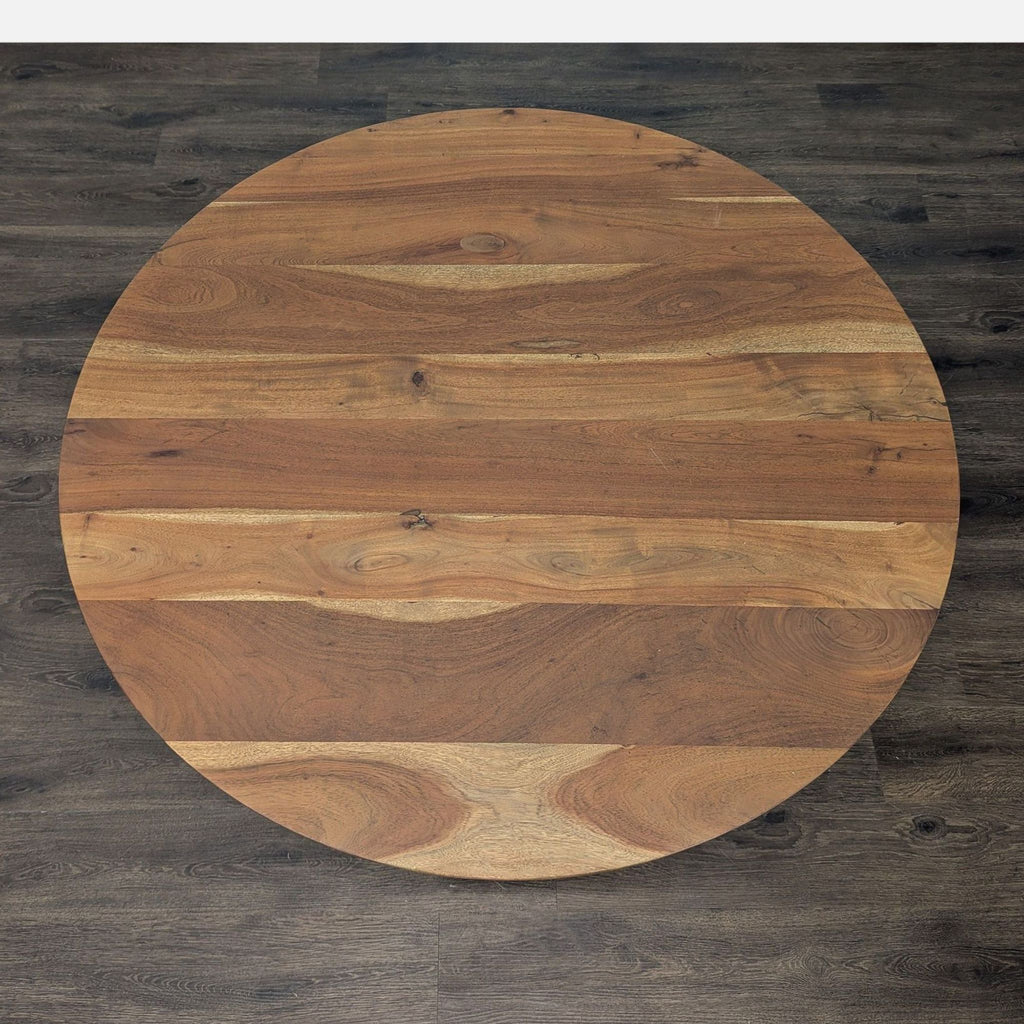 Adjustable-height acacia dining table with metal center support, industrial style, by Crate and Barrel.