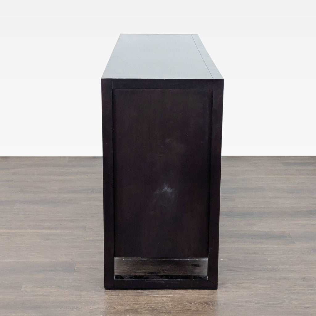 3. Casana brand dark wood dresser viewed from the side, showing sleek, contemporary panel design.