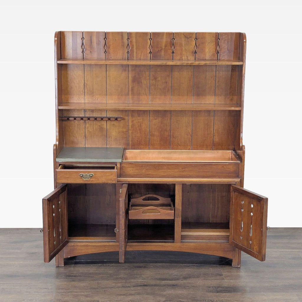 Link-Taylor armoire with stone top, copper ice insert, bar section, three doors, and serving tray.