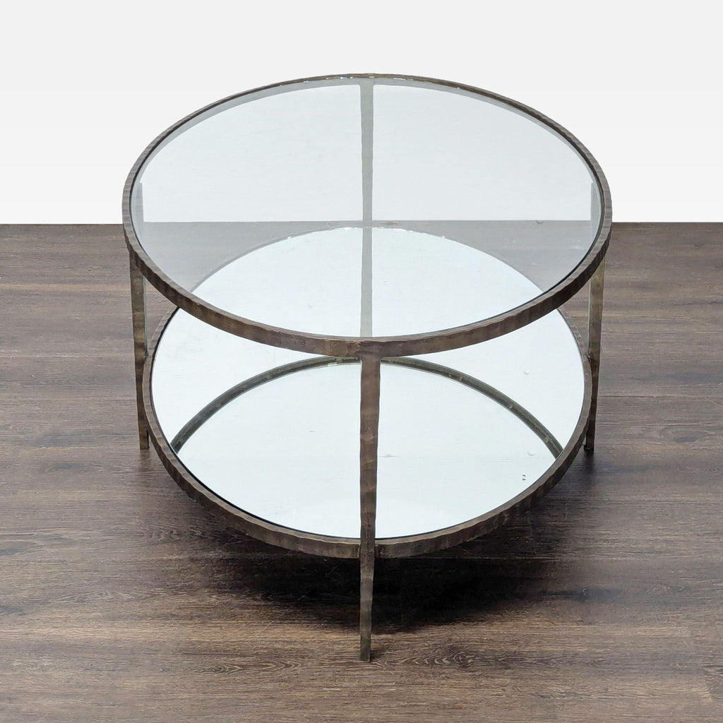 3. Modern coffee table with a handcrafted, hammered wrought iron base.