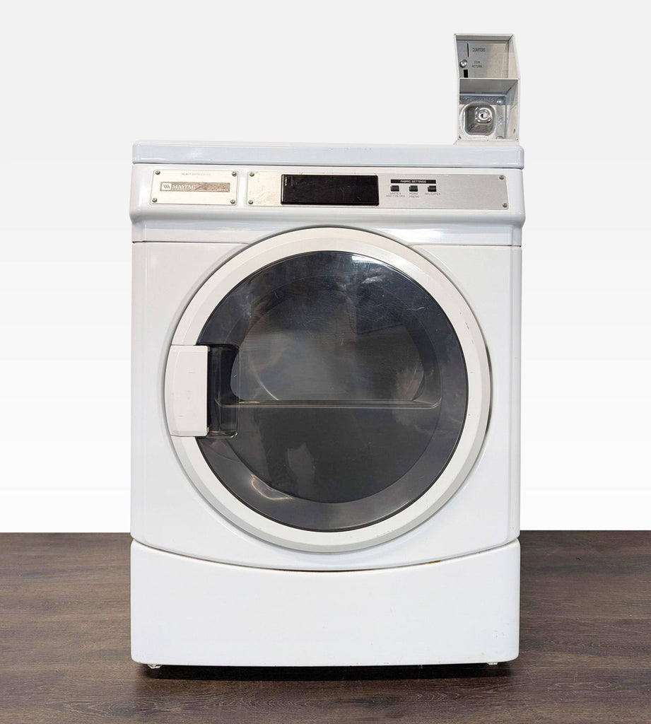 Maytag commercial front load dryer in white, designed for heavy-duty use with advanced airflow and large capacity.