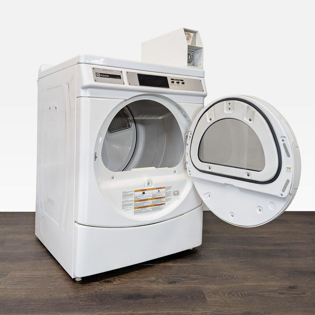Maytag commercial dryer, classic white, features microprocessor controls and efficient drying for laundromat environments.