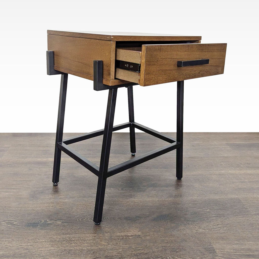 Modern end table by Whalen Furniture featuring a wooden drawer and minimalist metal legs.