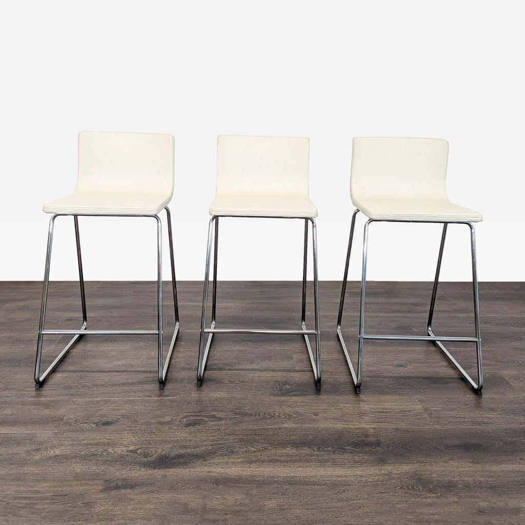 Soft leather stool with chrome-plated frame, designed by Ola Wihlborg for Ikea.
