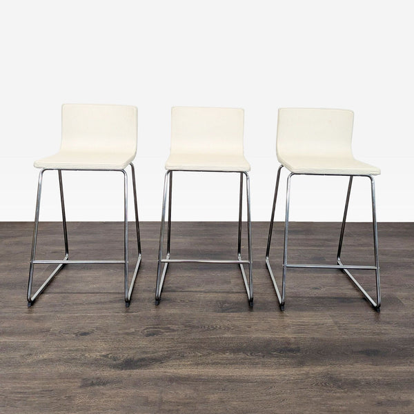 Soft leather stool with chrome-plated frame, designed by Ola Wihlborg for Ikea.