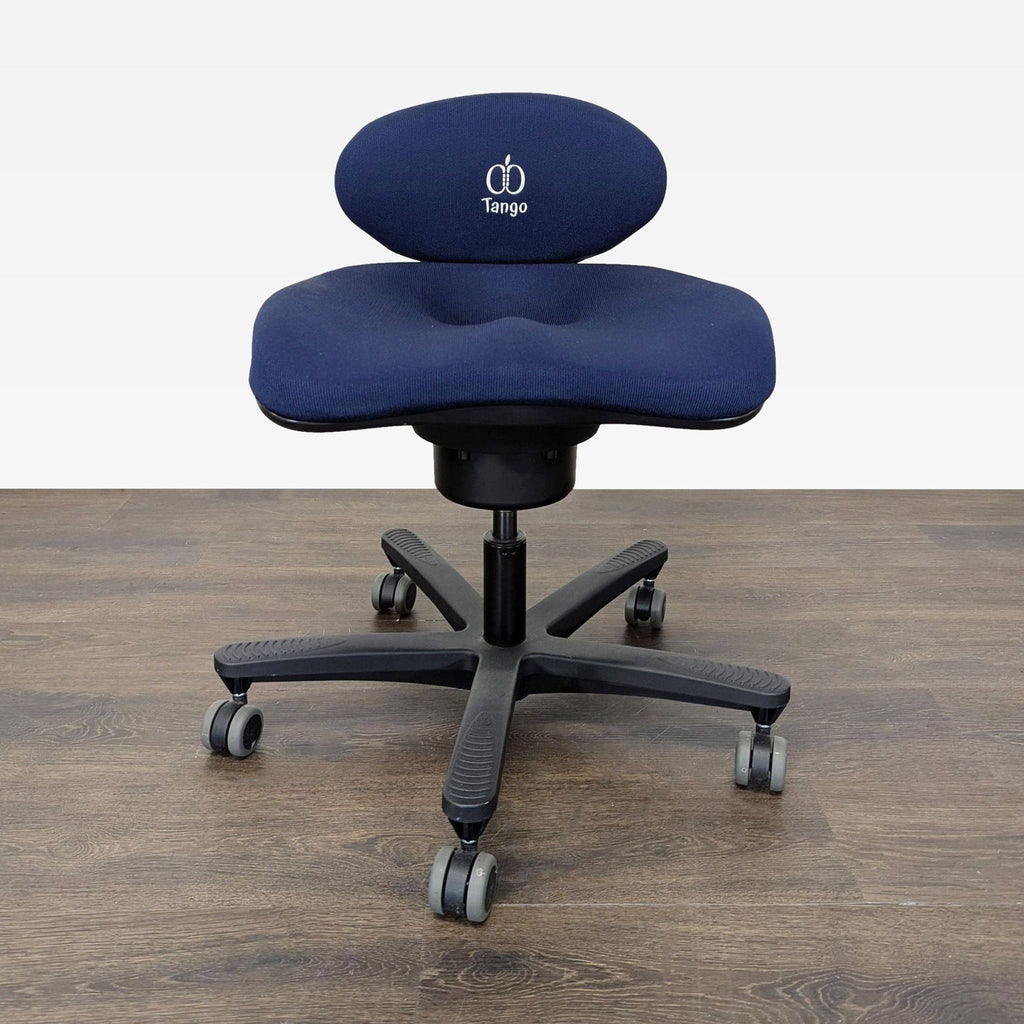 1. Front view of a CoreChair Tango ergonomic office chair in dark blue with five wheels and contoured seat.