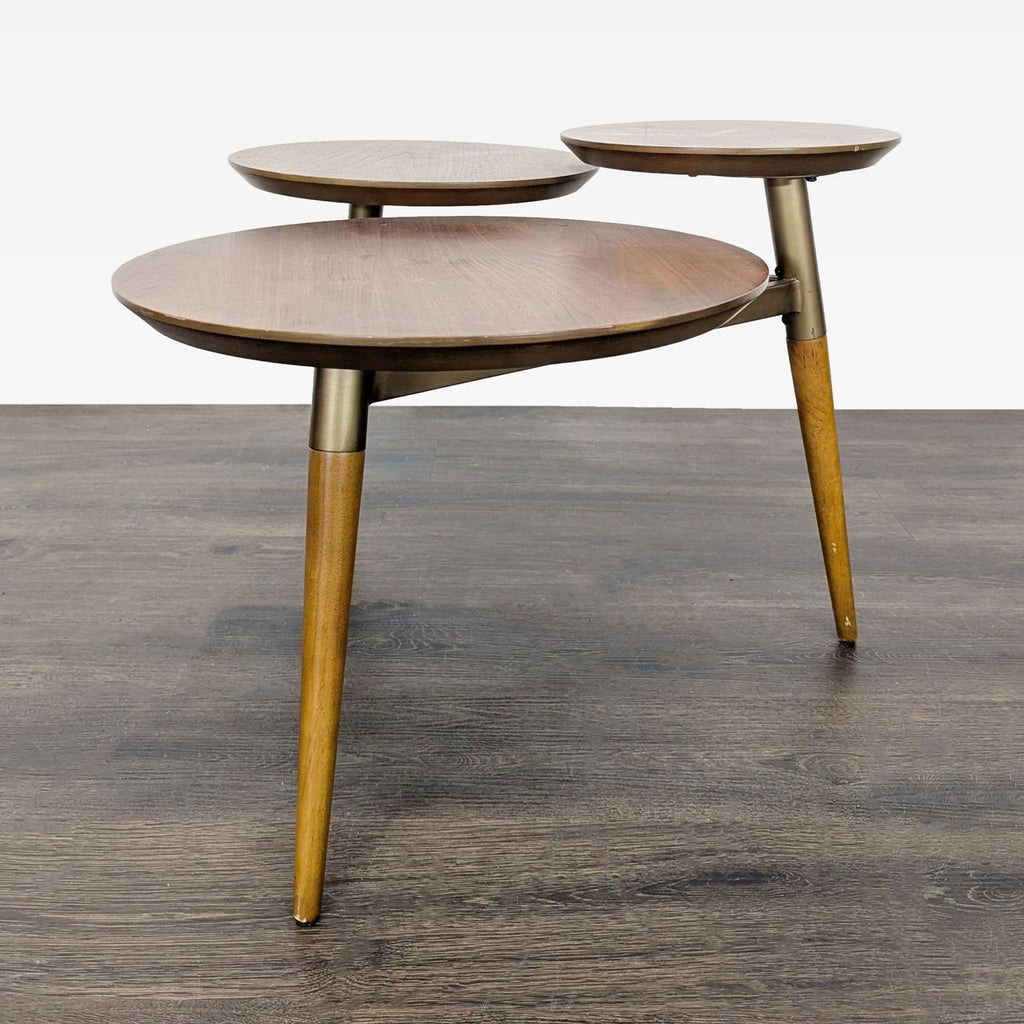 Three-tiered walnut and brass end table with a Mid-Century design by West Elm.