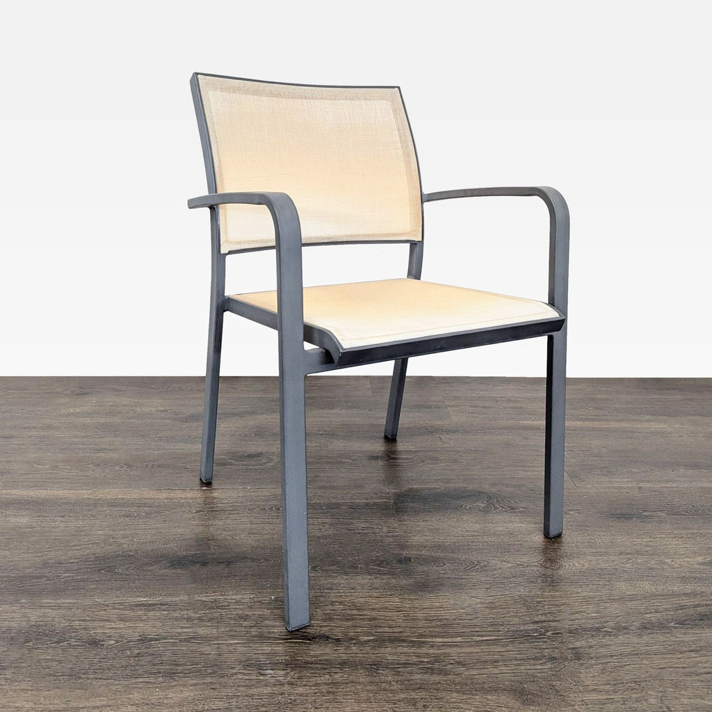 2. Single modern chair with a beige mesh seat and back, grey metal frame, and curved armrests.  