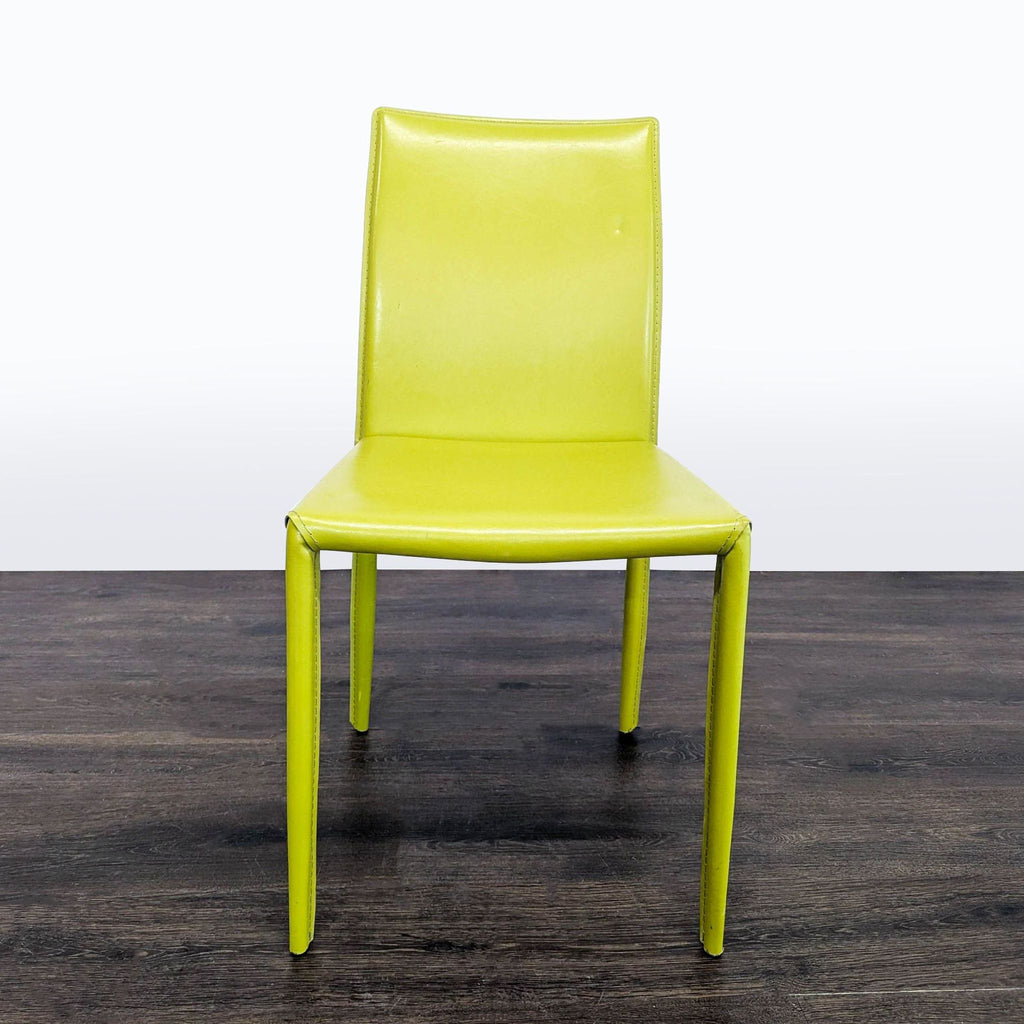 1. Modern dining chair with wooden legs and cushioned fabric seat in a neutral tone.