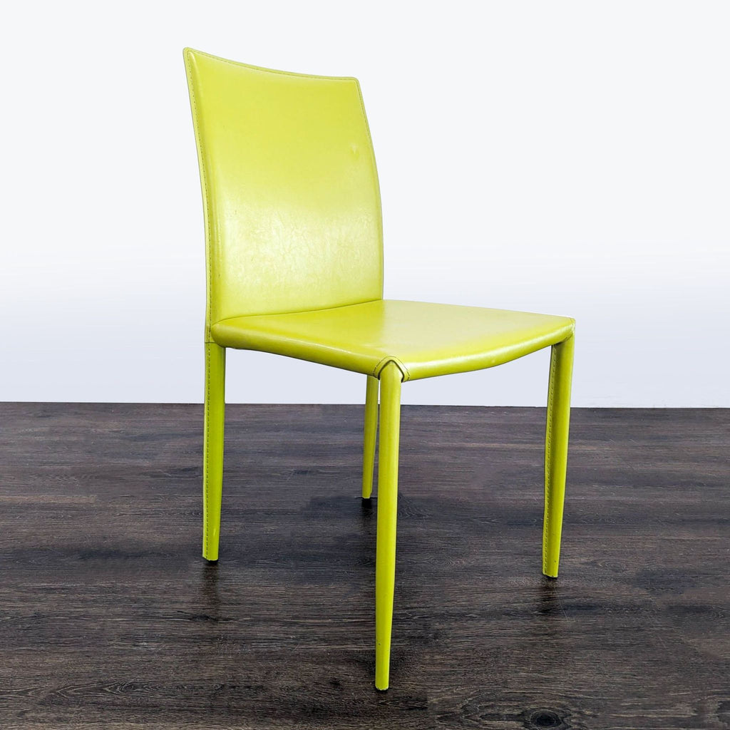 2. Contemporary dining chair featuring a sleek, minimalist frame and curved backrest.