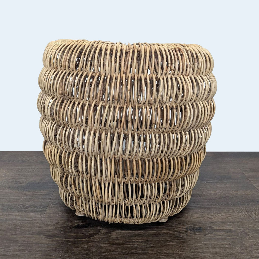 2. Single woven rattan side or console table with a barrel shape, shown against a light background.