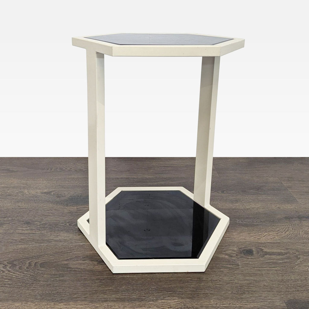 Modern console table featuring a black glass surface and base set in a minimalist white metal frame.  
