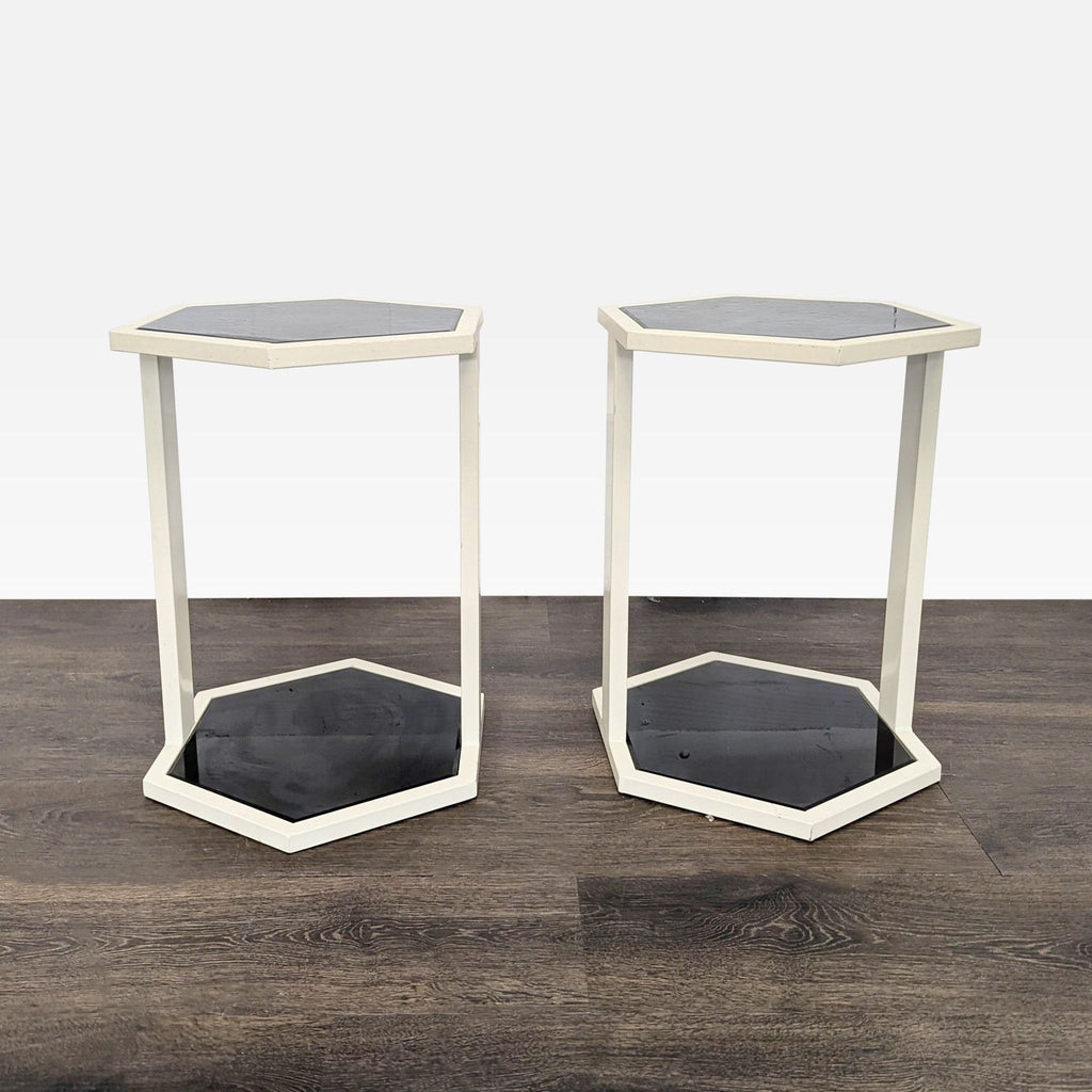 Sleek Nate Berkus side table with a white metal frame and black glass top, perfect for modern spaces.  