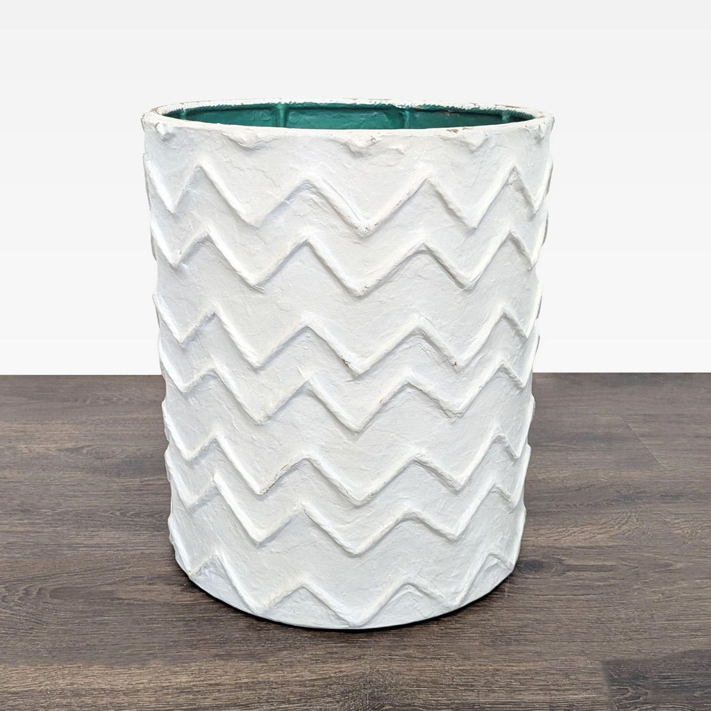 Plaster-textured planter vase with a subtle, tactile surface design.  