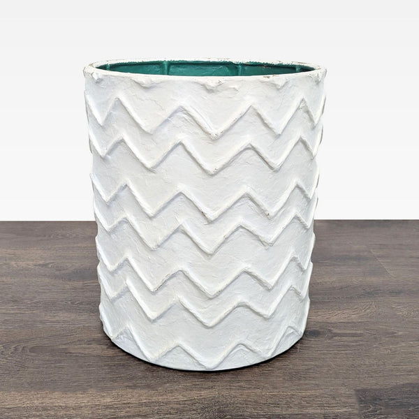 Plaster-textured planter vase with a subtle, tactile surface design.  