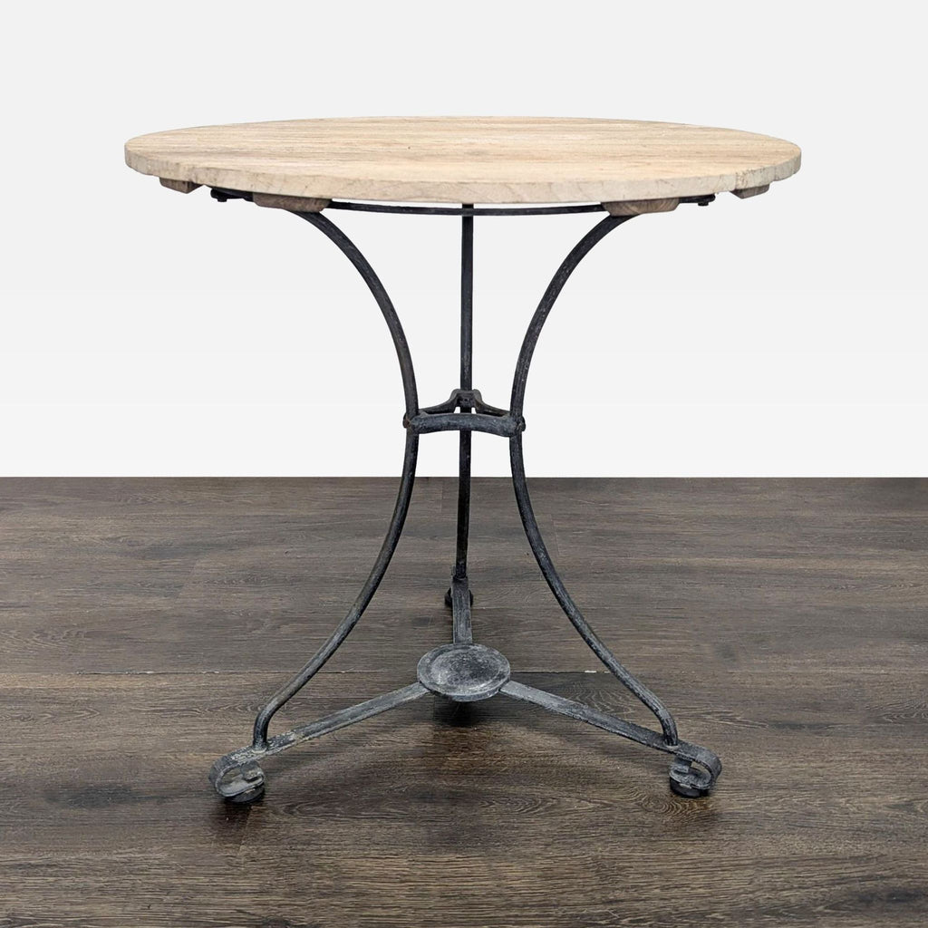 Two wooden chairs with slatted seats and a matching round table, metal-framed, by Smith & Hawken, dining set.  