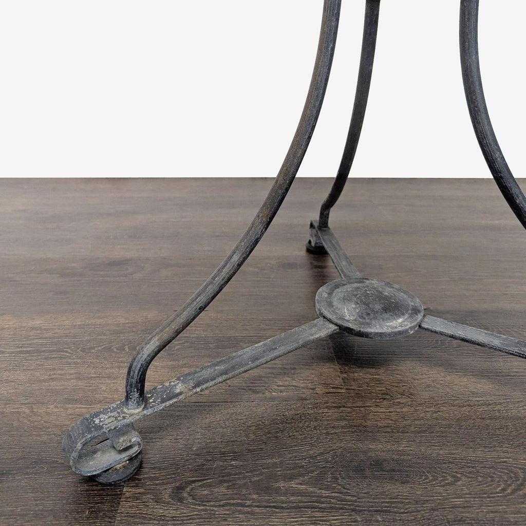 Compact Smith & Hawken round dining table and two matching wood chairs with sturdy metal frames, classic style.