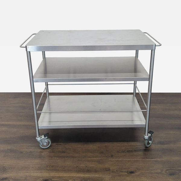 1. Stainless steel kitchen cart with three shelves and wheels for extra storage and easy mobility.