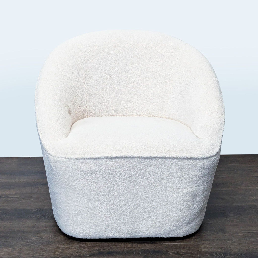 Eluxury swivel lounge chair with curved back and white boucle fabric, offering modern comfort and style.