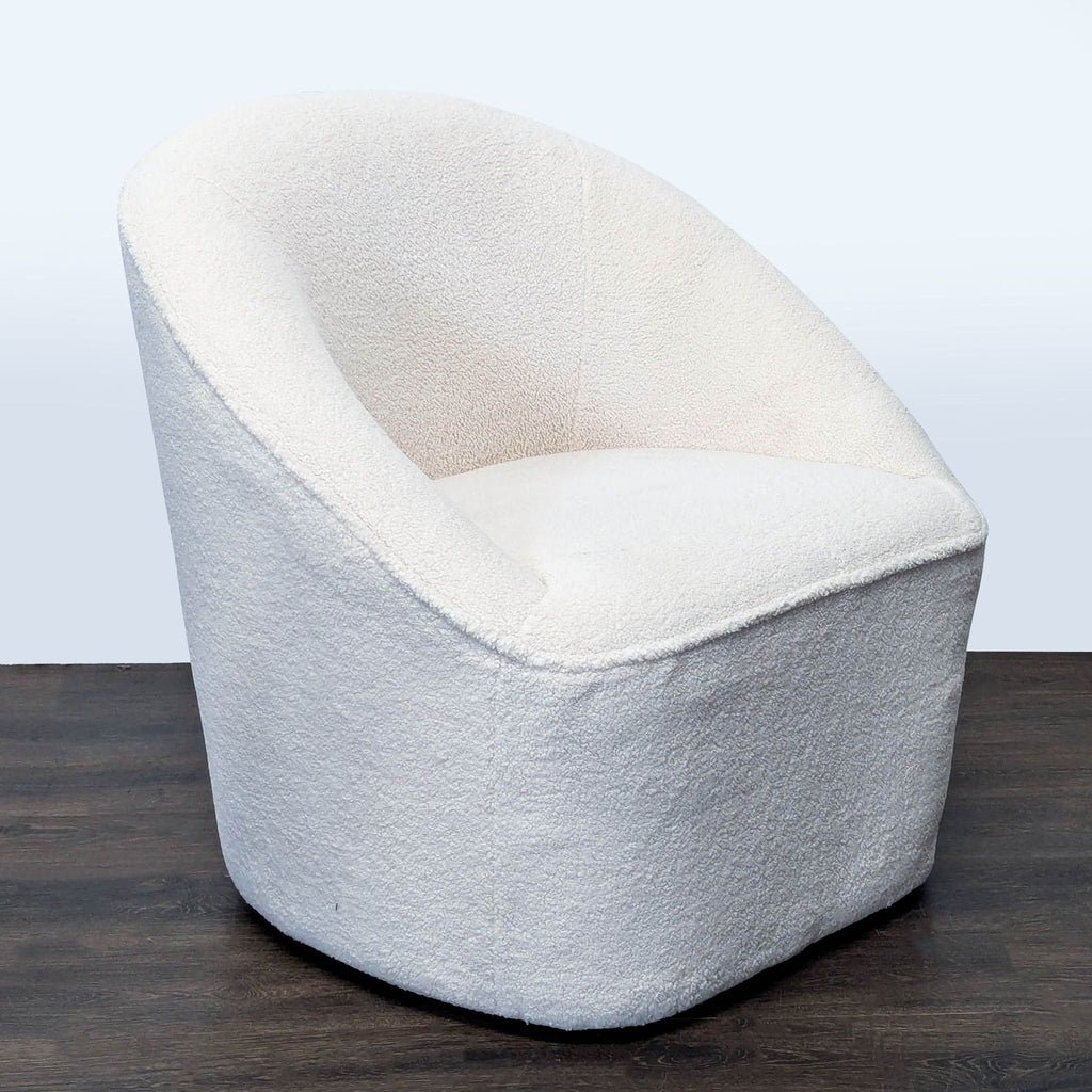 Modern white boucle lounge chair by Eluxury, featuring a supportive curved back and smooth swivel base.