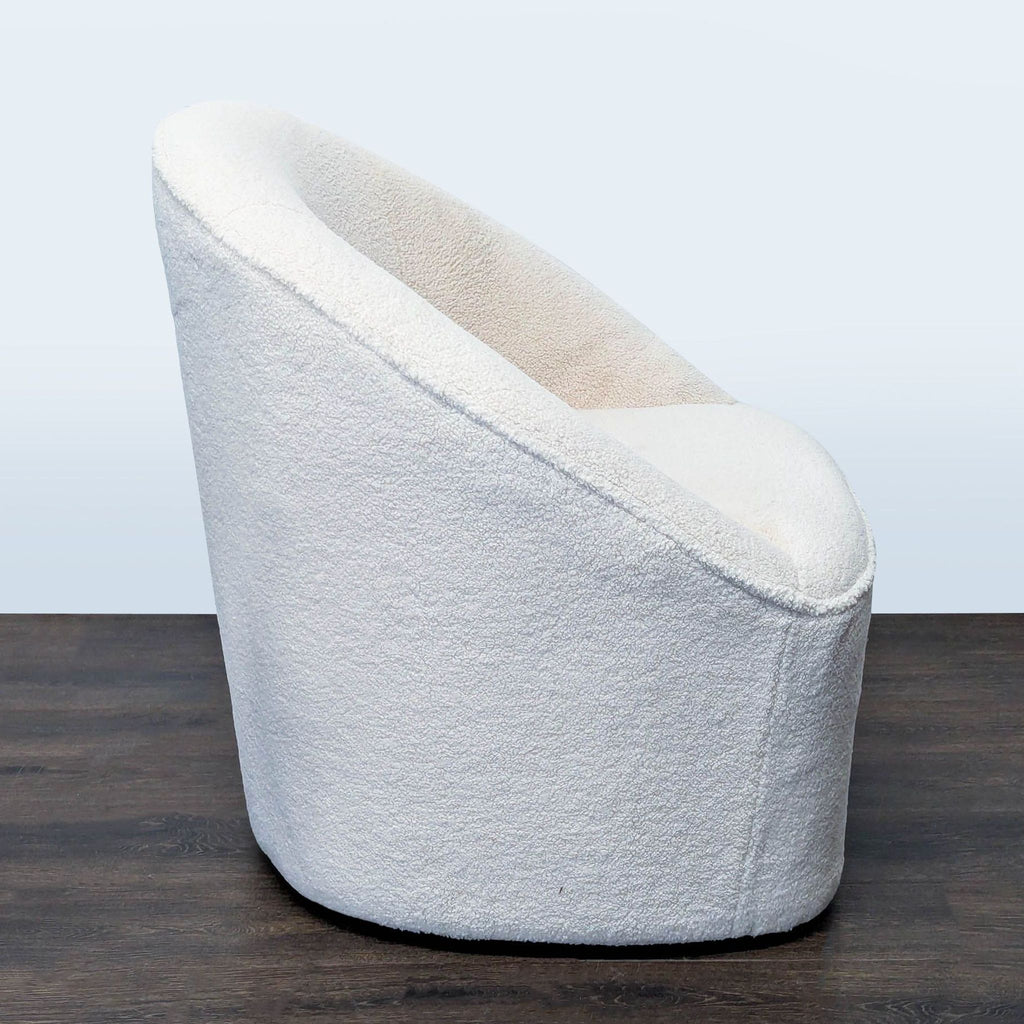 Contemporary Eluxury lounge chair in soft white boucle, designed for comfort in living rooms or lounges.