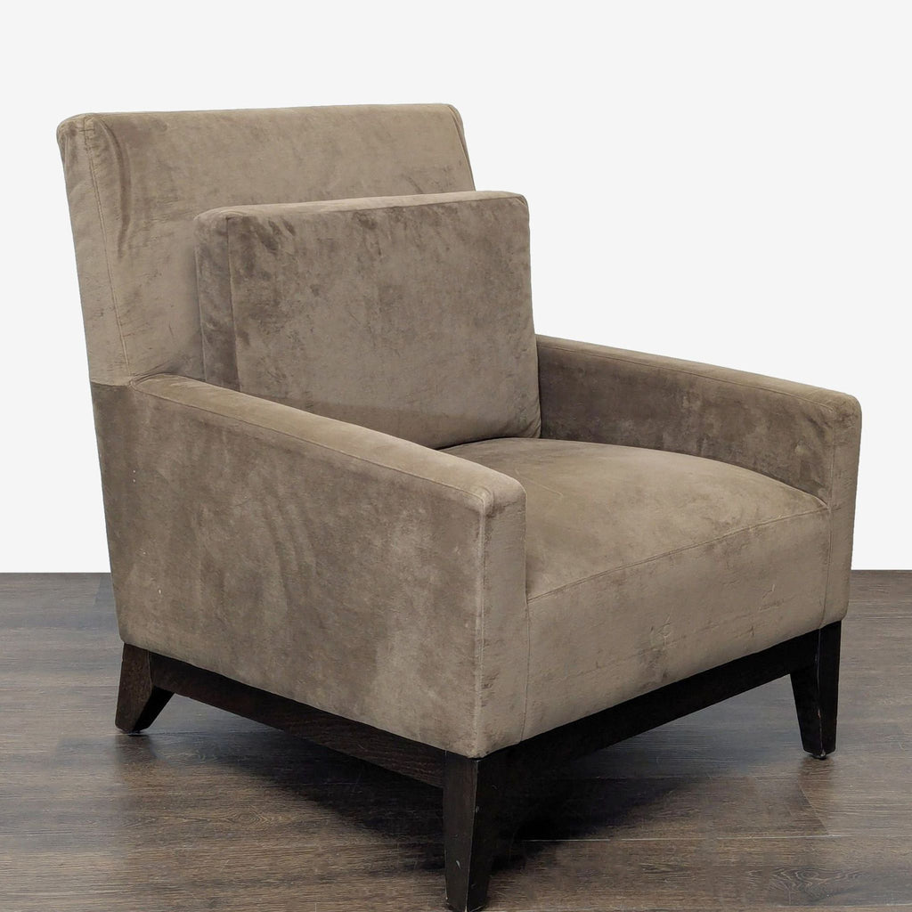 West Elm lounge chair in soft brown fabric, featuring clean lines and comfortable cushioning, minor wear visible.