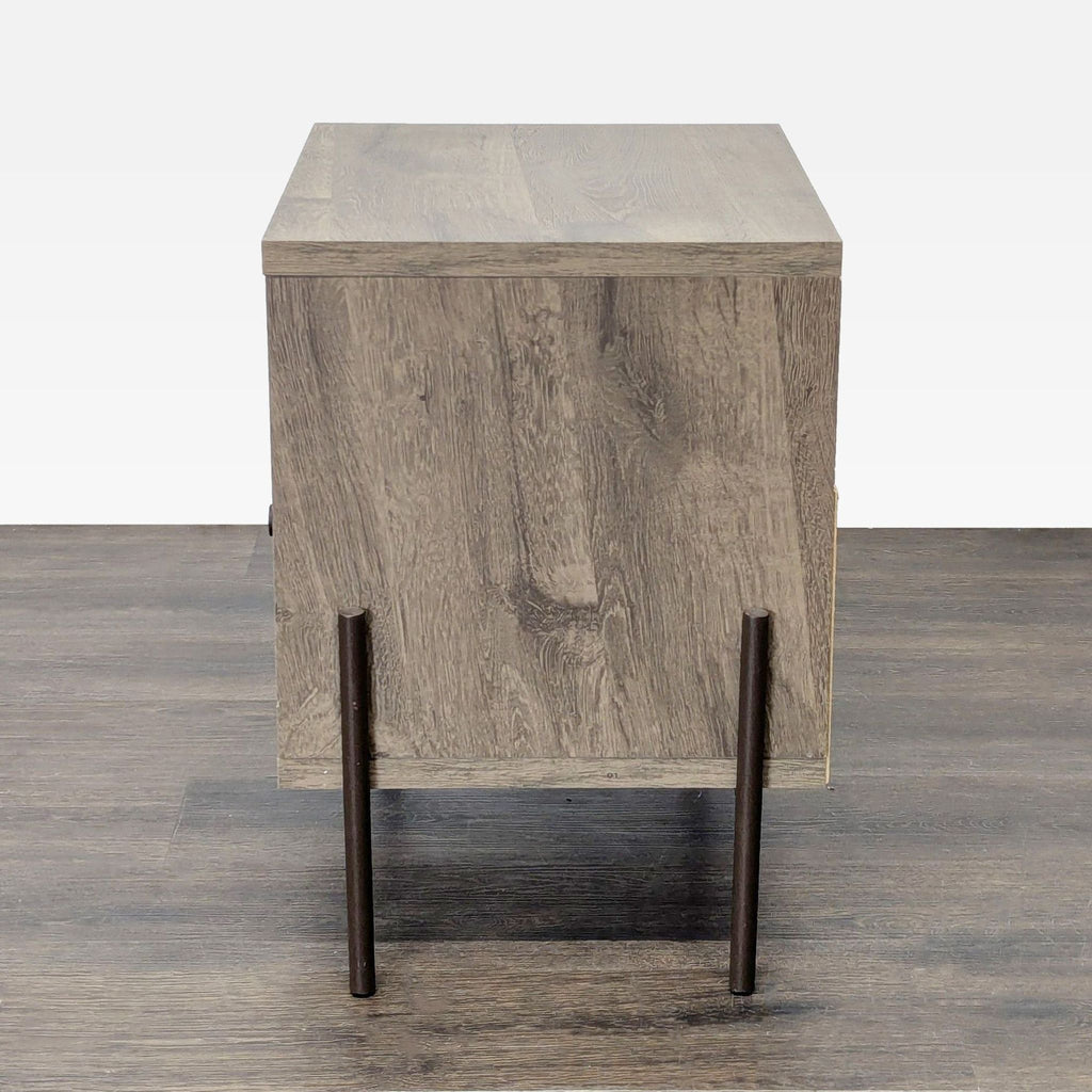 3. Rear view of a wooden end table with metal legs, highlighting its sturdy frame and simple design.