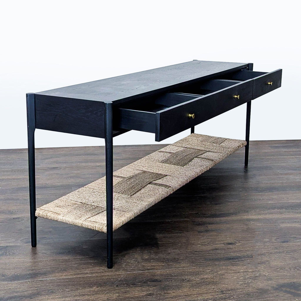 Arhaus side & console table, brass hardware, three drawers, and a woven rope shelf underneath.