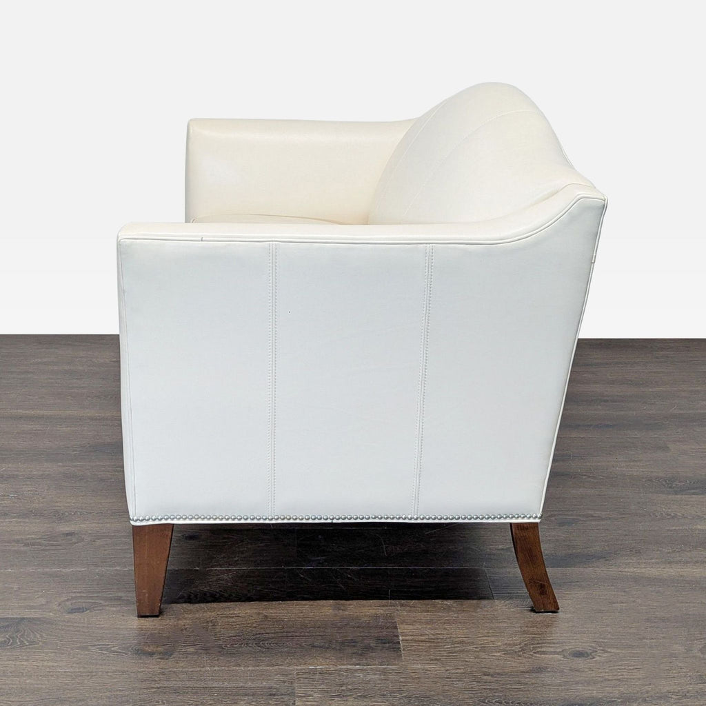 Ethan Allen Cream Leather Loveseat with Wood Legs