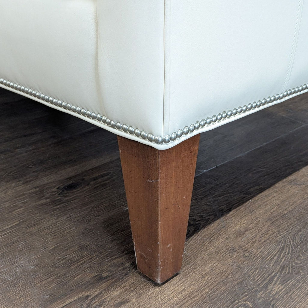 Ethan Allen Cream Leather Loveseat with Wood Legs