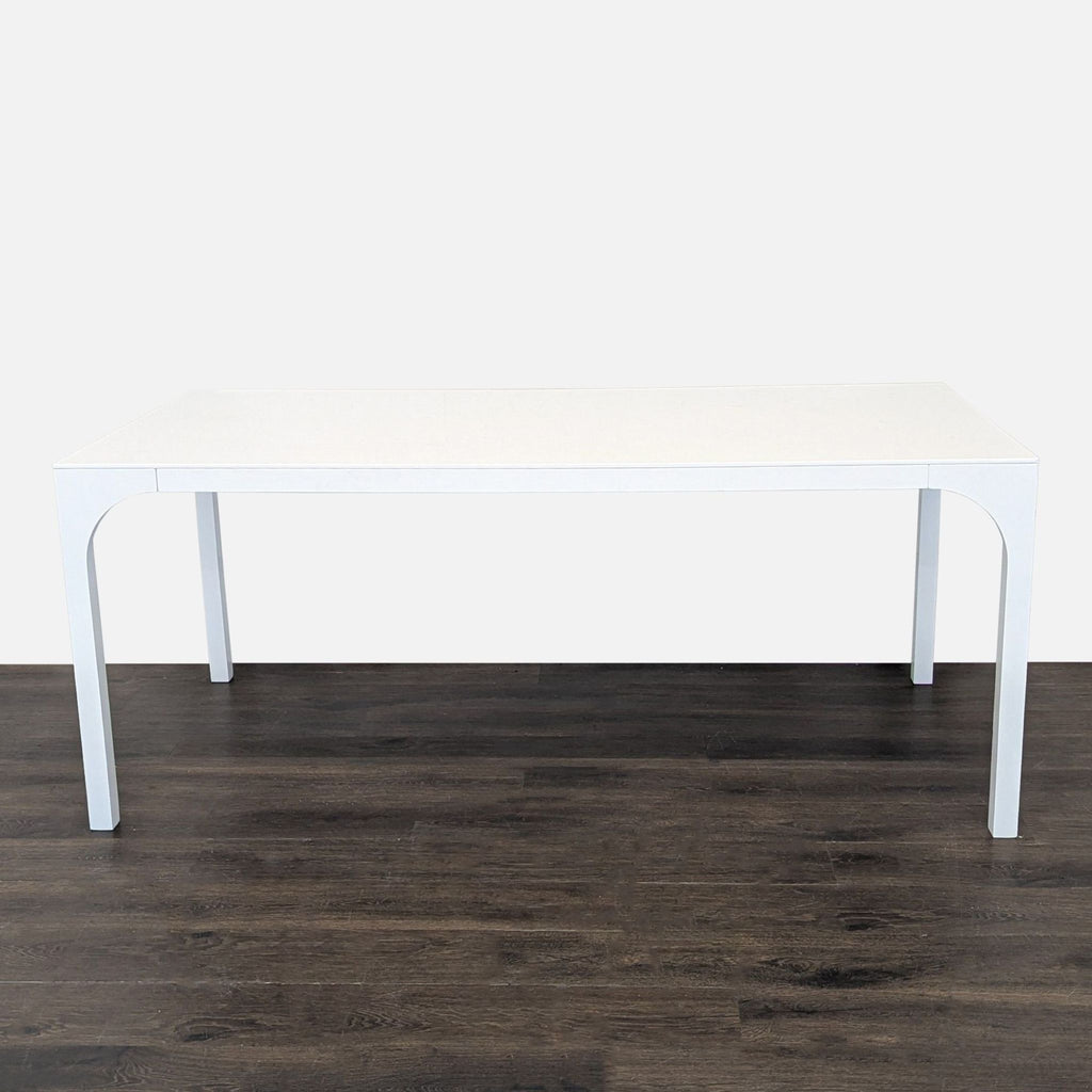 High-gloss modern table by Euga Design Studio for CB2, features fluid, continuous curves echoing Eurail and aqueduct forms.  