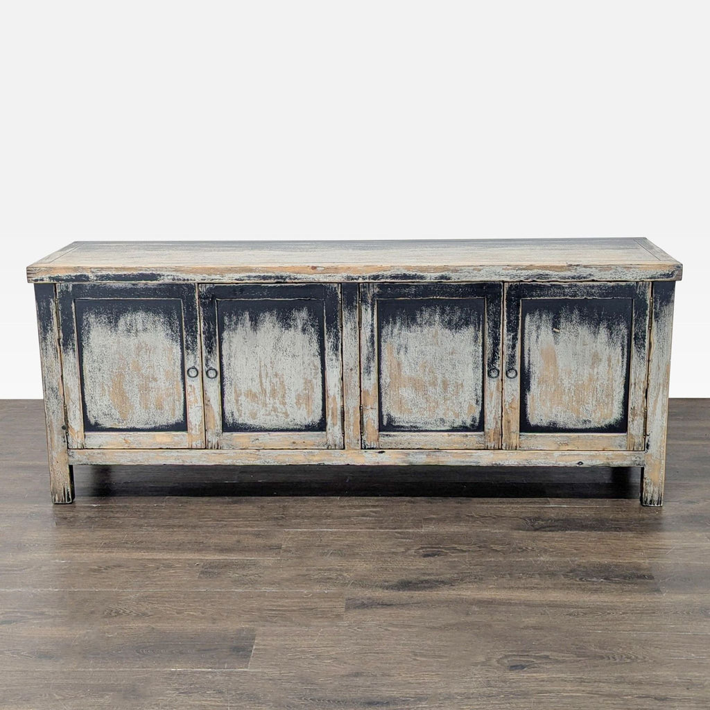 Distressed black pine media console with copper hardware, European antique-inspired, by Four Hands.  