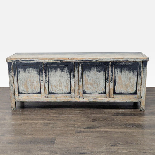 Distressed black pine media console with copper hardware, European antique-inspired, by Four Hands.  