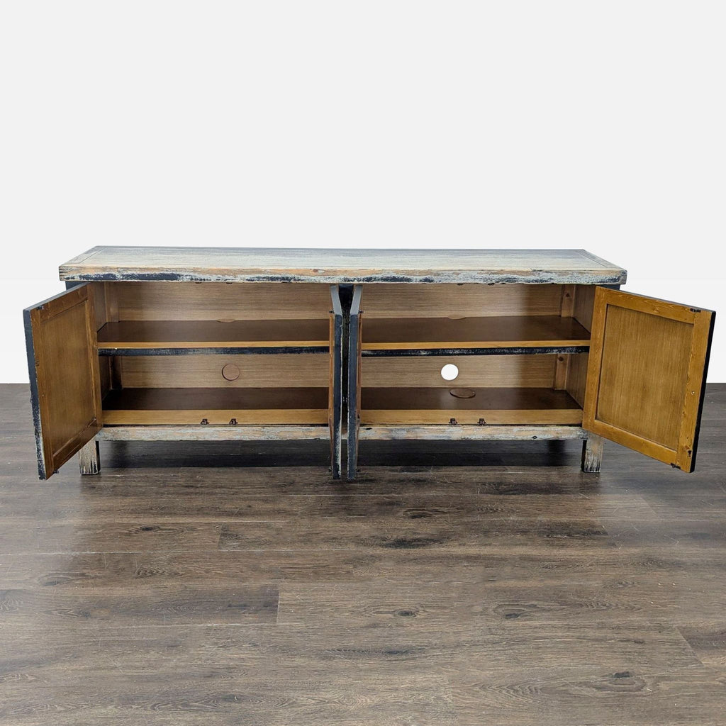Black pine entertainment center with copper accents, vintage European style, Four Hands brand.  