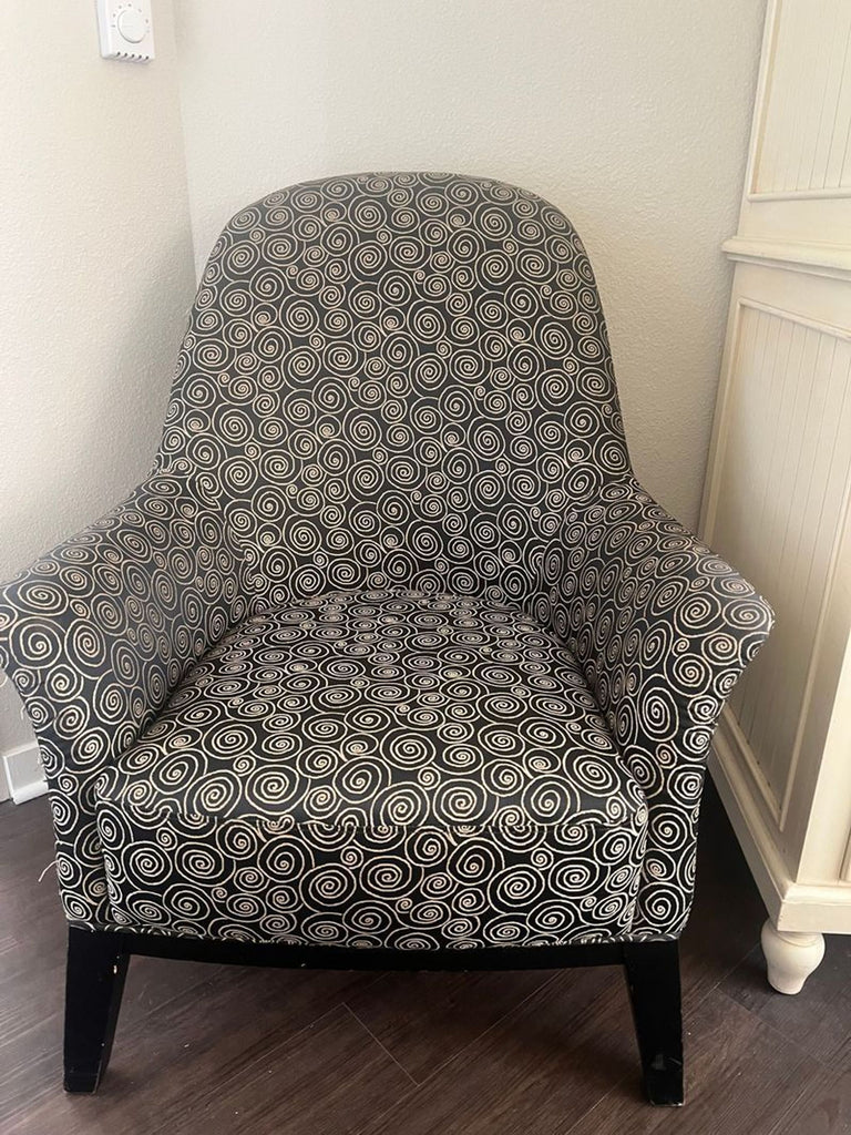 1. Mid-century modern lounge chair with clean lines and wooden legs, suitable for stylish living spaces.  