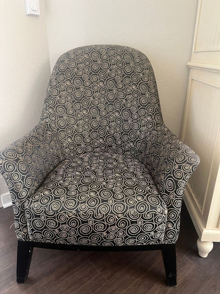 1. Mid-century modern lounge chair with clean lines and wooden legs, suitable for stylish living spaces.  