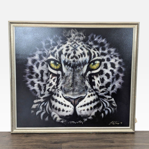 1. Framed Craig Tracy print featuring a detailed leopard face with striking yellow eyes, under Prints & Maps.