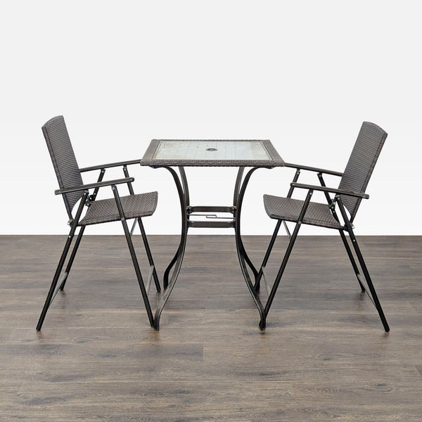 1. Outdoor set with a square glass table and two foldable wicker chairs on a wooden floor, metal frames visible.