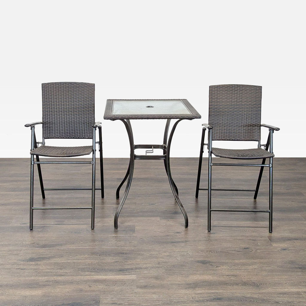 3. Set of two matching wicker chairs and a square glass table, perfect for balconies or small outdoor spaces.