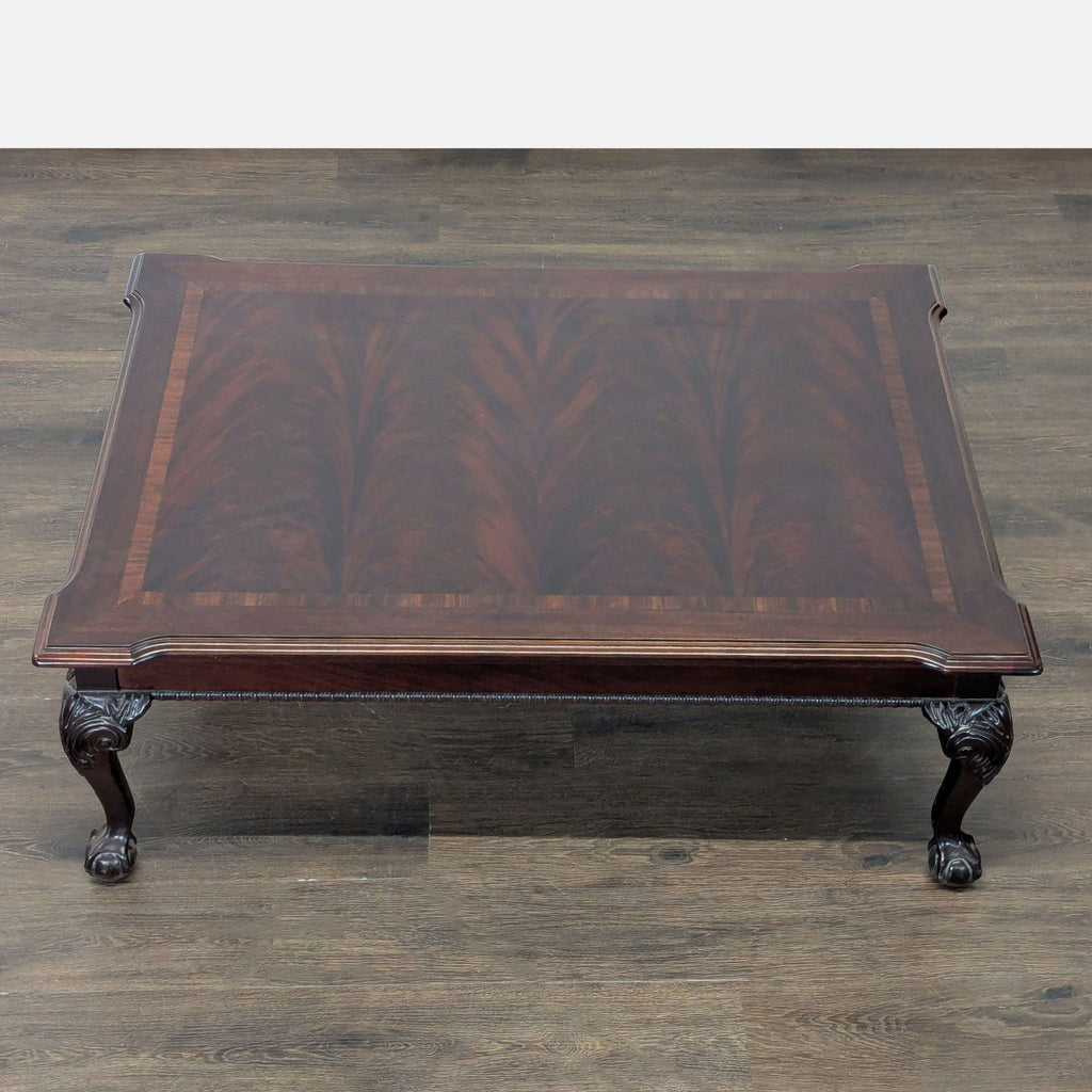 3. English Chippendale style coffee table by Thomasville with acanthus carved legs and dramatic flame veneer.