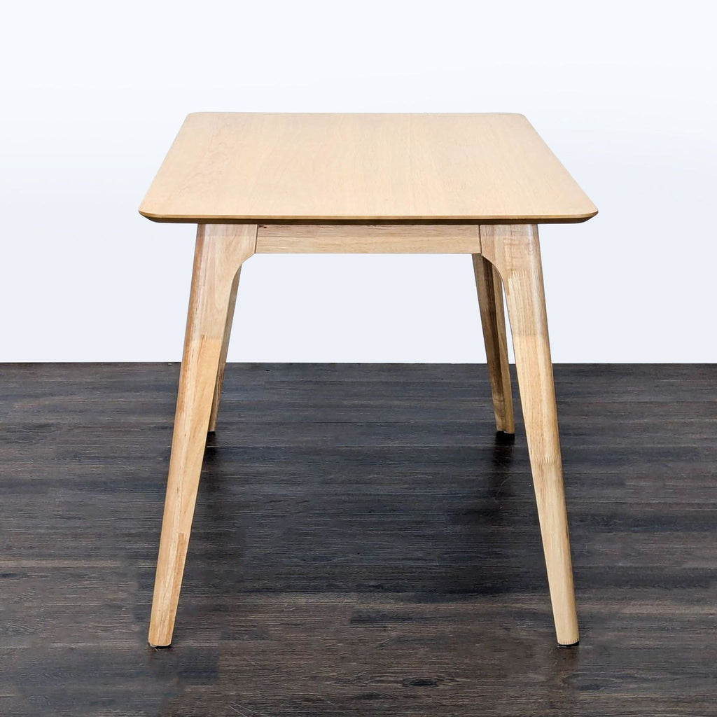 2. Elegant Noble House for West Elm dining table, featuring clean lines and sturdy legs.